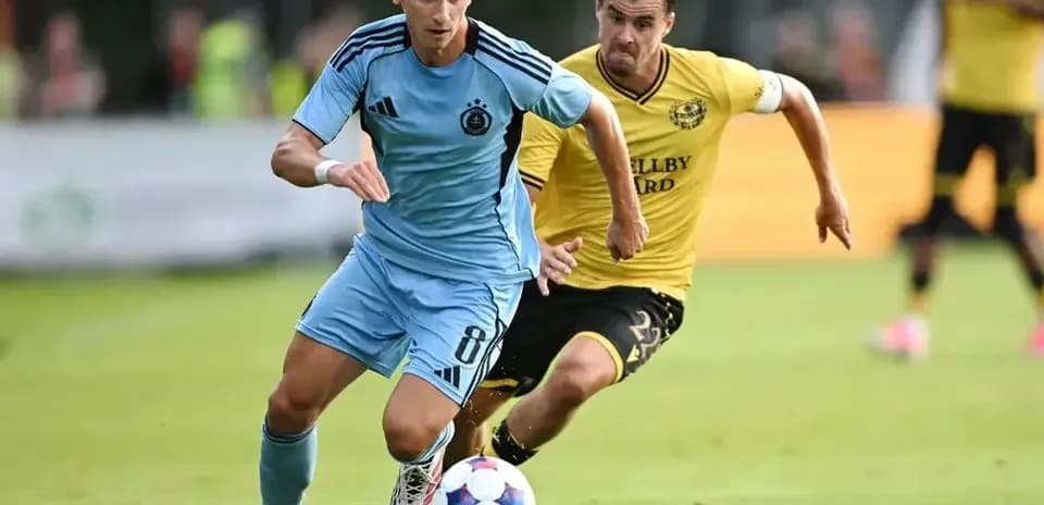 Player dribbling during Slovan Bratislava match