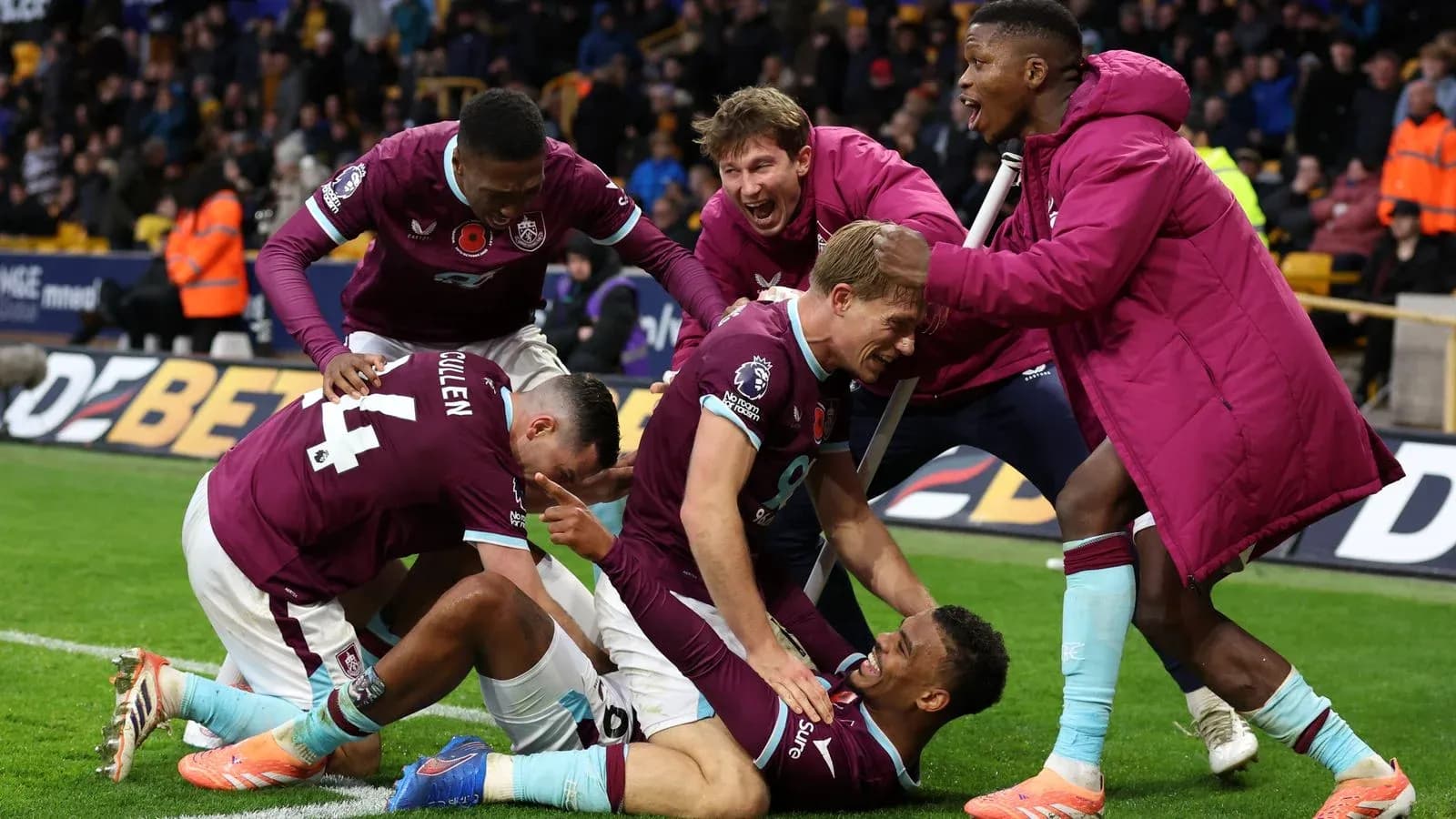 Burnley players celebrating a goal during match