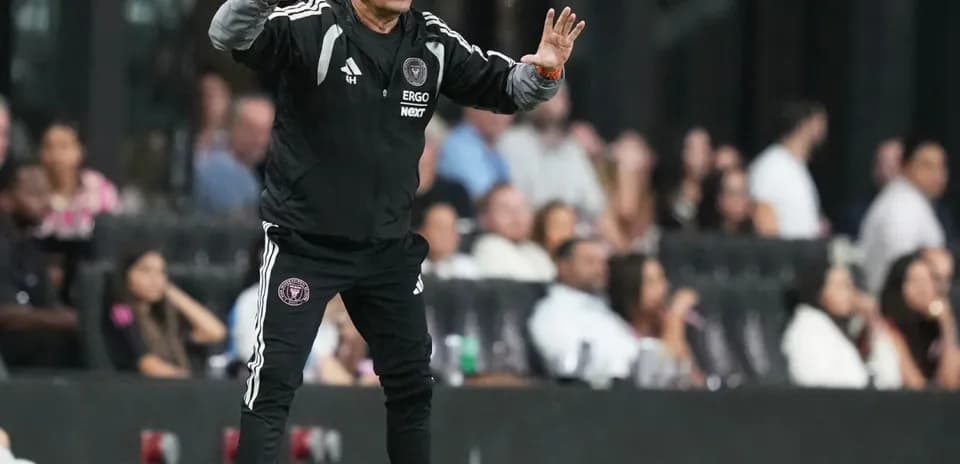 Coach giving instructions during a match