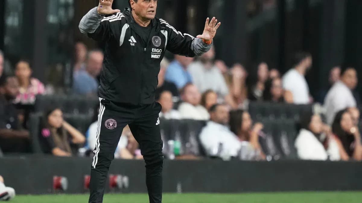 Coach giving instructions during a match