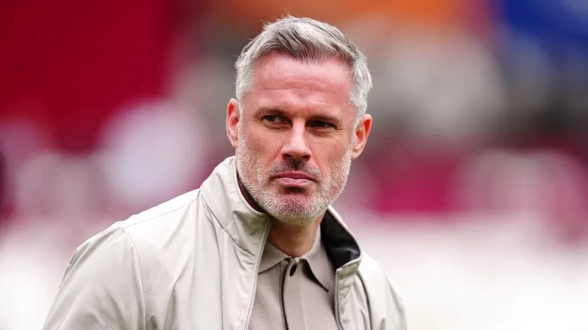 Man with gray hair wearing a light jacket