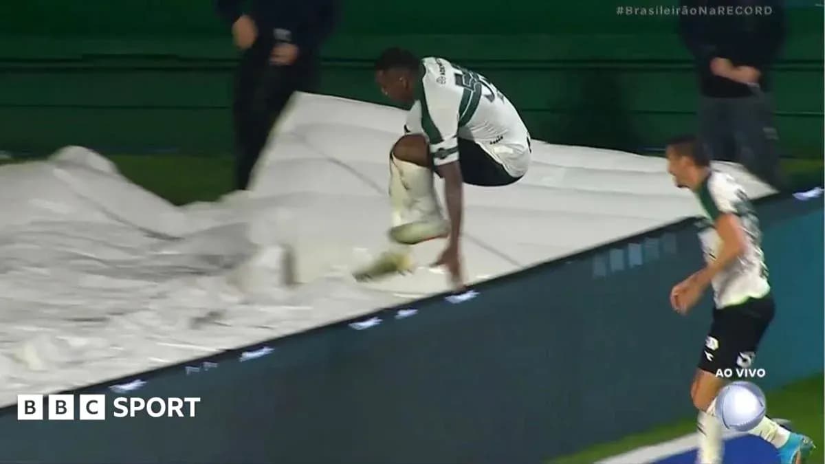 Player jumping over a tarp during the match