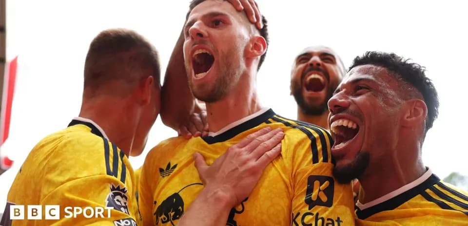 Players celebrating a goal with enthusiasm