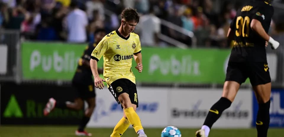 Player passing the ball during Charleston Battery match