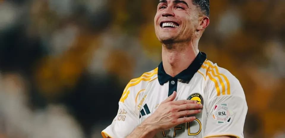 Player celebrating with hand on chest during match