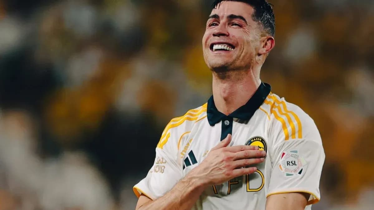 Player celebrating with hand on chest during match