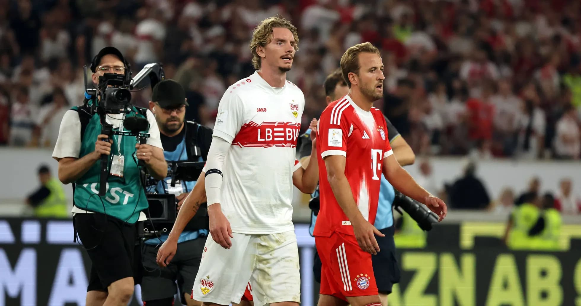 Players walking off the field after the match