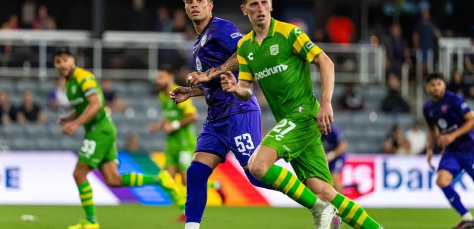 Players from Louisville City and Tampa Bay Rowdies in action