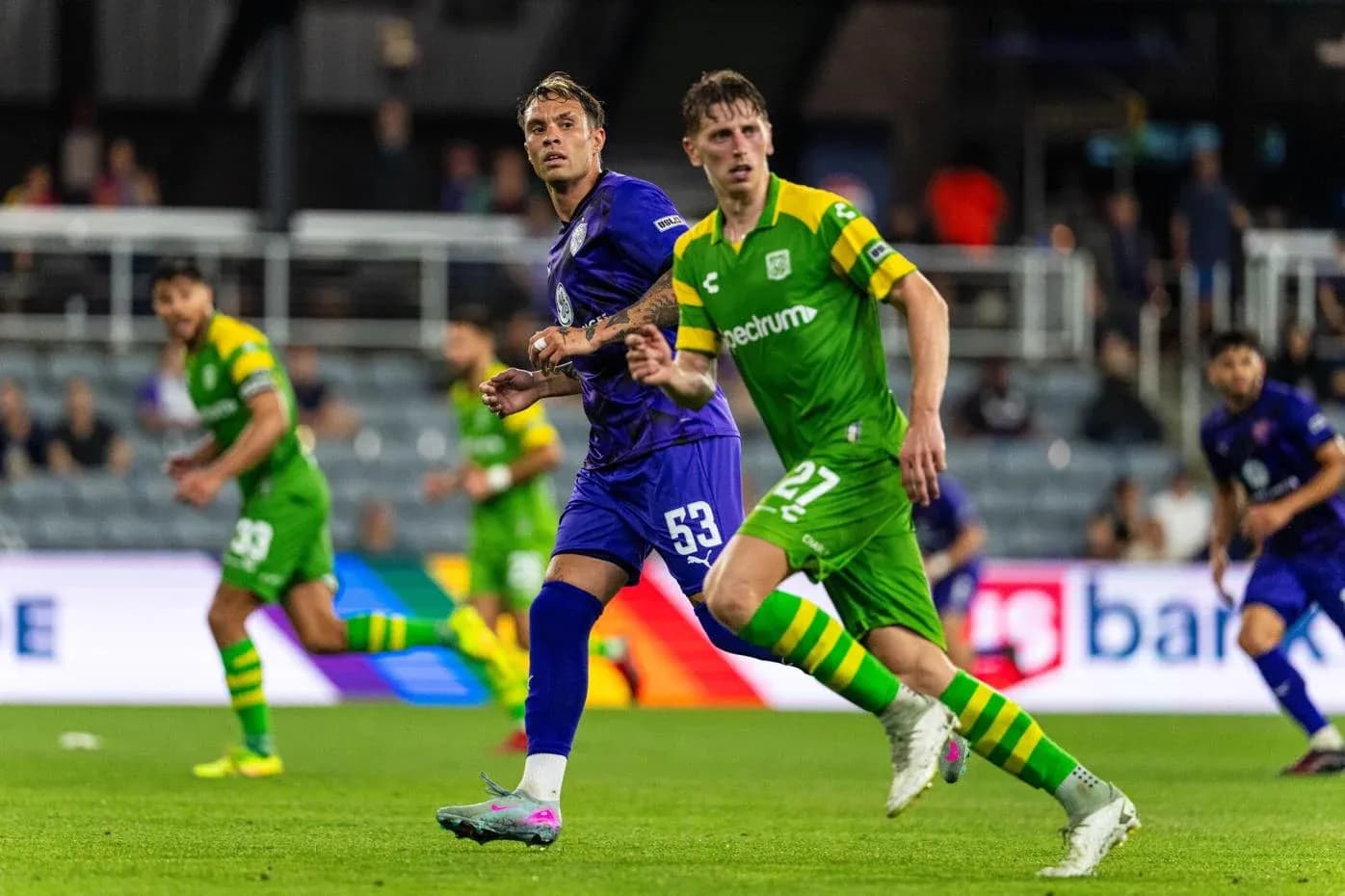 Players from Louisville City and Tampa Bay Rowdies in action