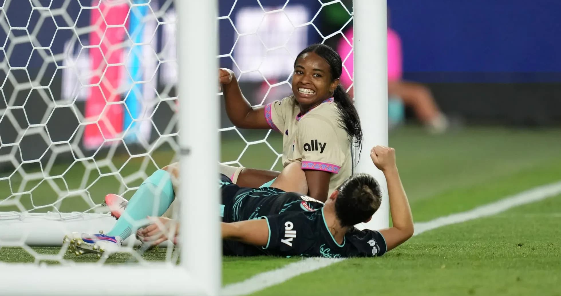 Player celebrating near goal during match