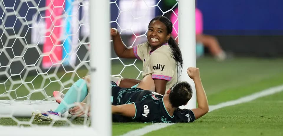 Player celebrating near goal during match