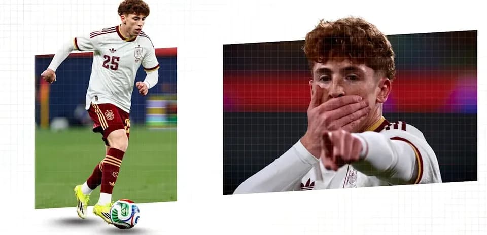 Player in Spain kit dribbling ball on field