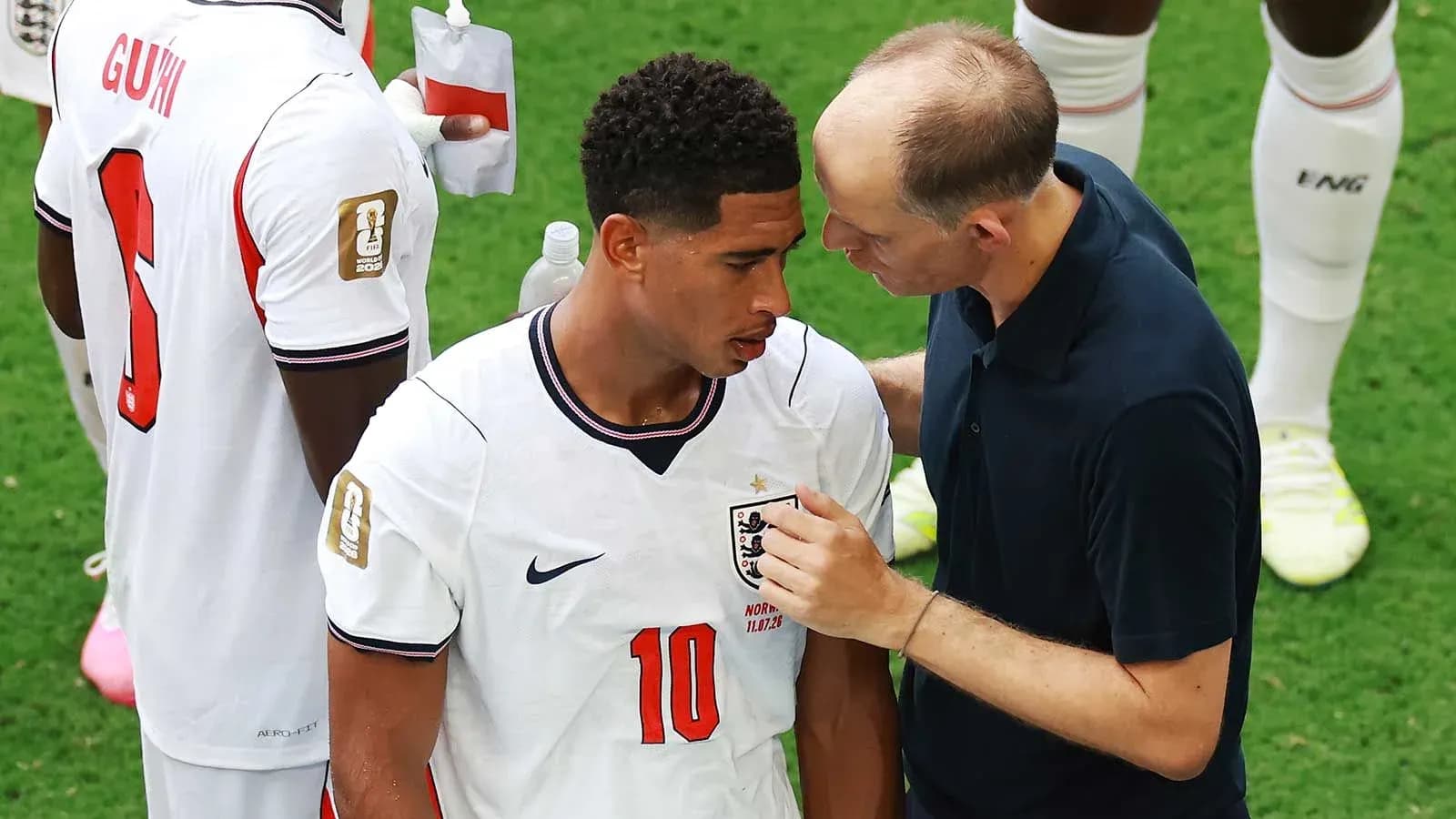 Player receiving instructions from coach during match