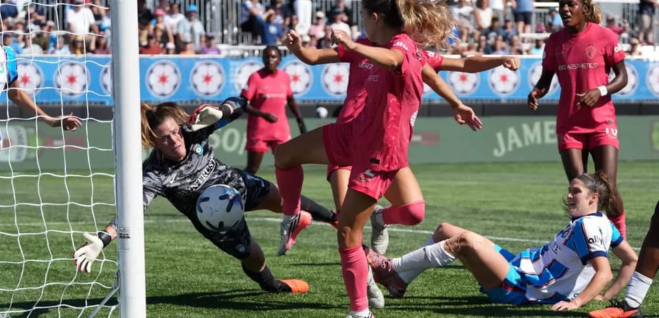 Goalkeeper making a save during match action