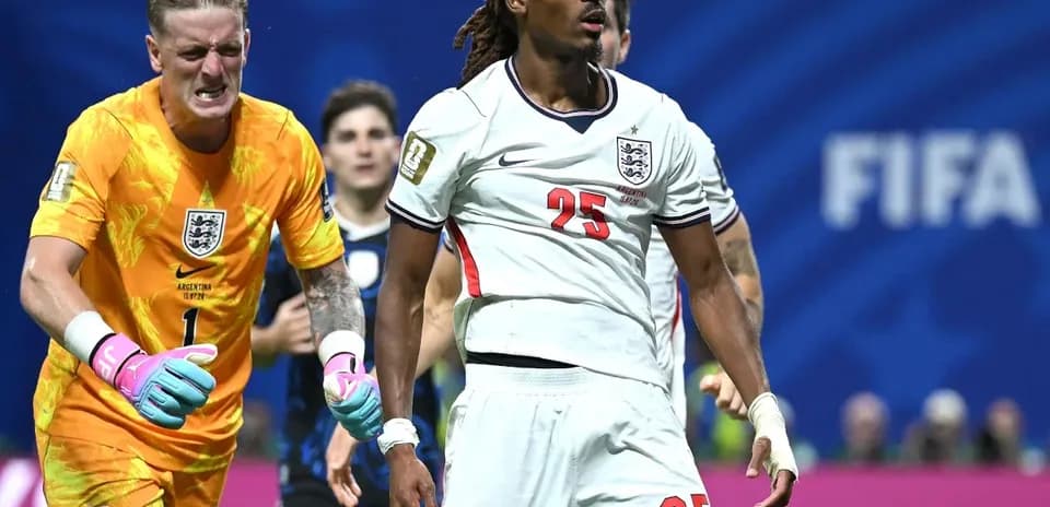 England players reacting during a tense match moment