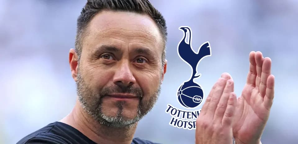 Manager applauding with Tottenham Hotspur logo background