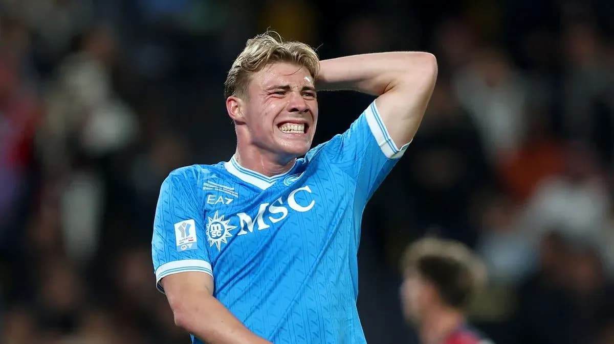 Player in blue jersey reacting during a match