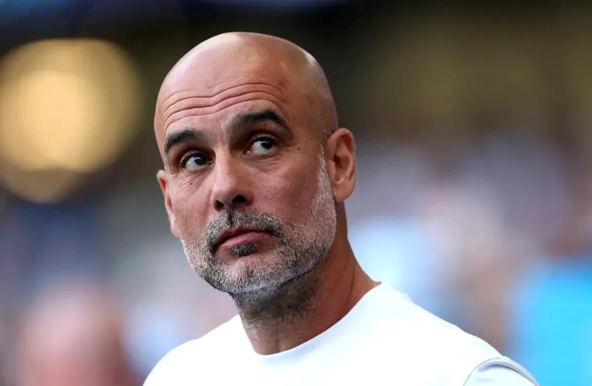 Coach observing match from sidelines with focused expression