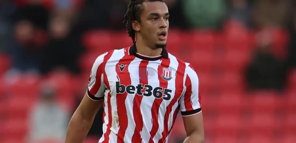 Player in Stoke City kit during match action