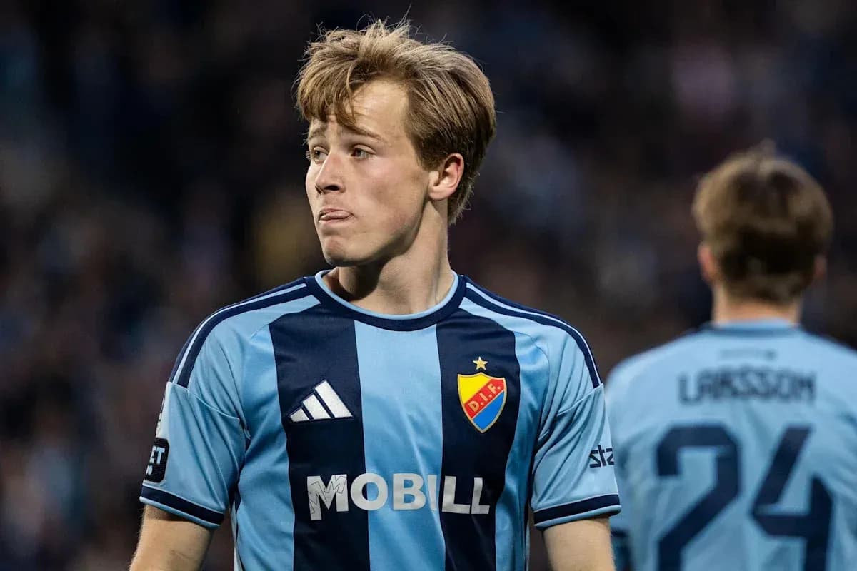 Player in blue jersey during football match