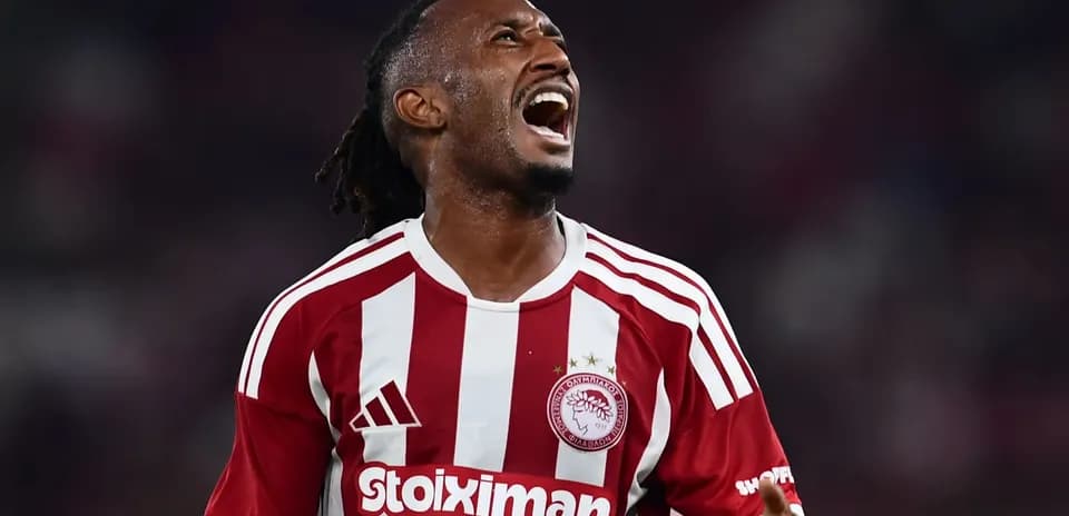 Olympiakos player celebrating during a match