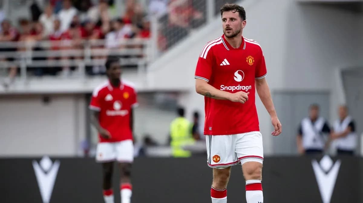 Player walking on field during match for Manchester United
