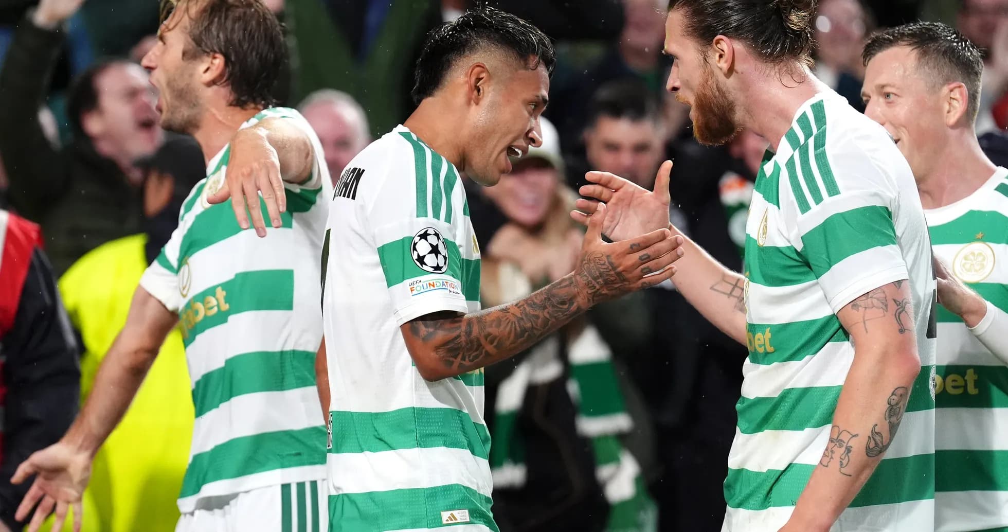 Celtic players celebrating during Champions League match