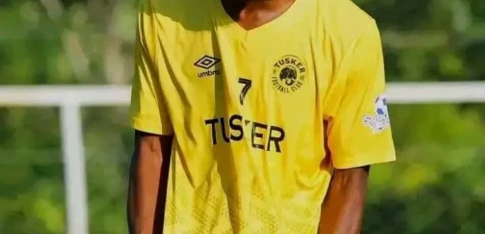 Player celebrating in yellow team jersey during match
