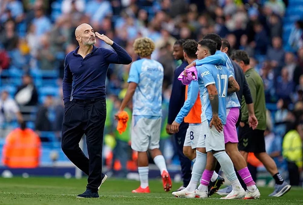 Manchester City players celebrating after match