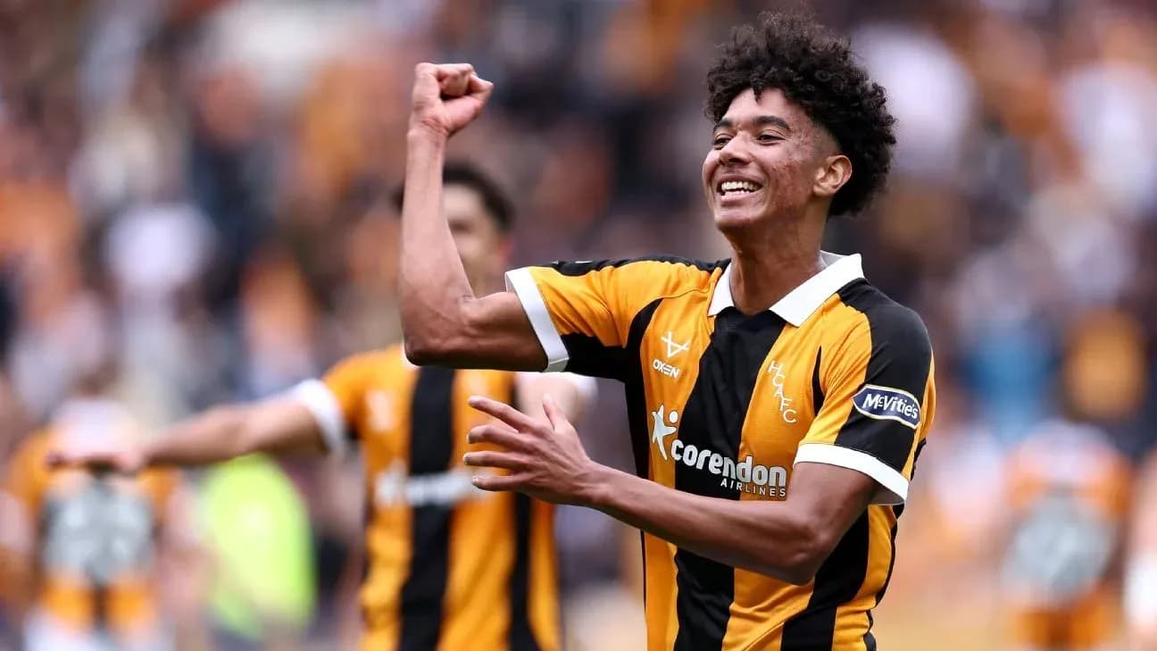 Player celebrating a goal in team uniform