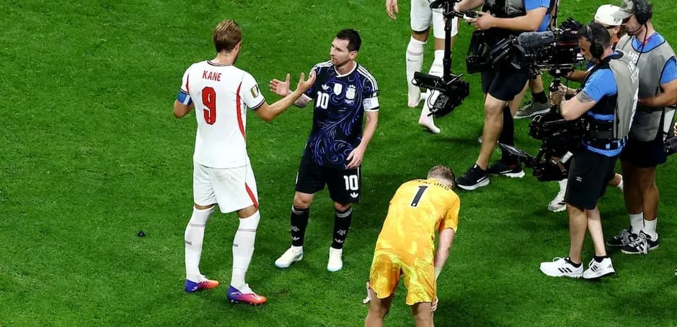 Kane and Messi interacting during World Cup match