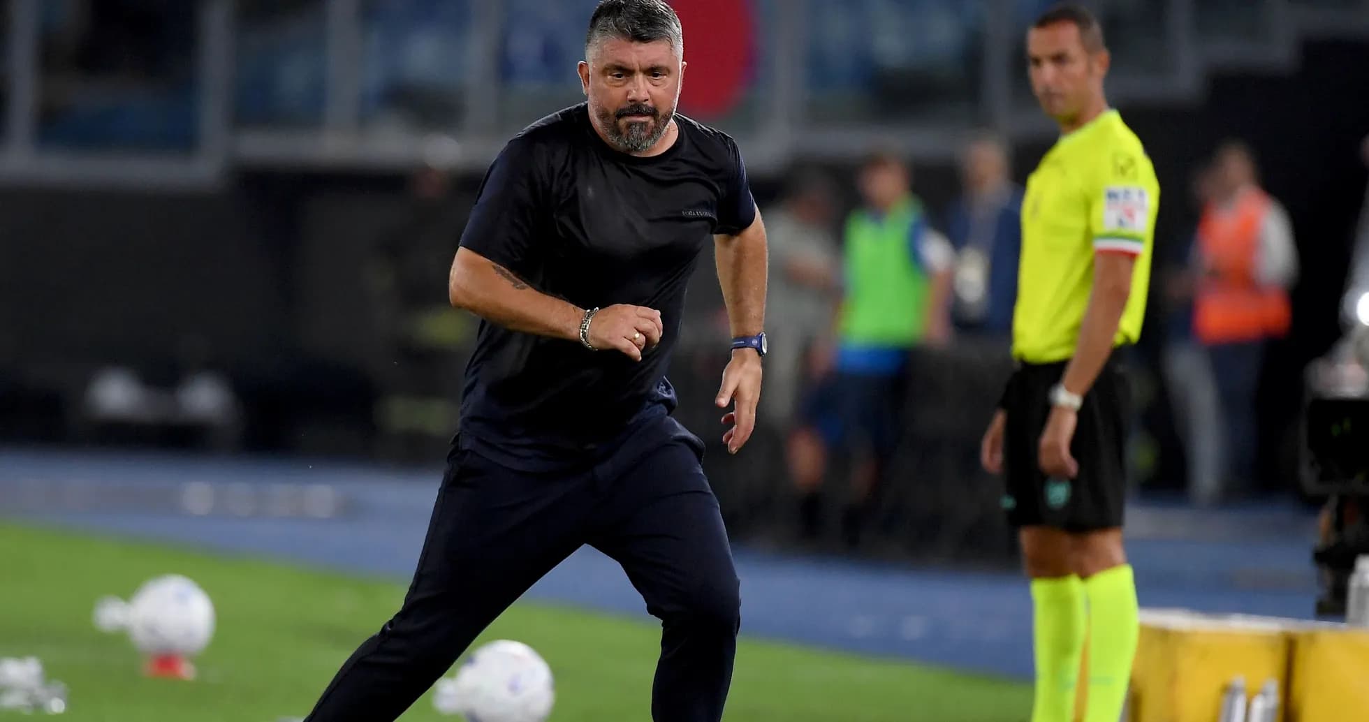Coach running along the sideline during a match