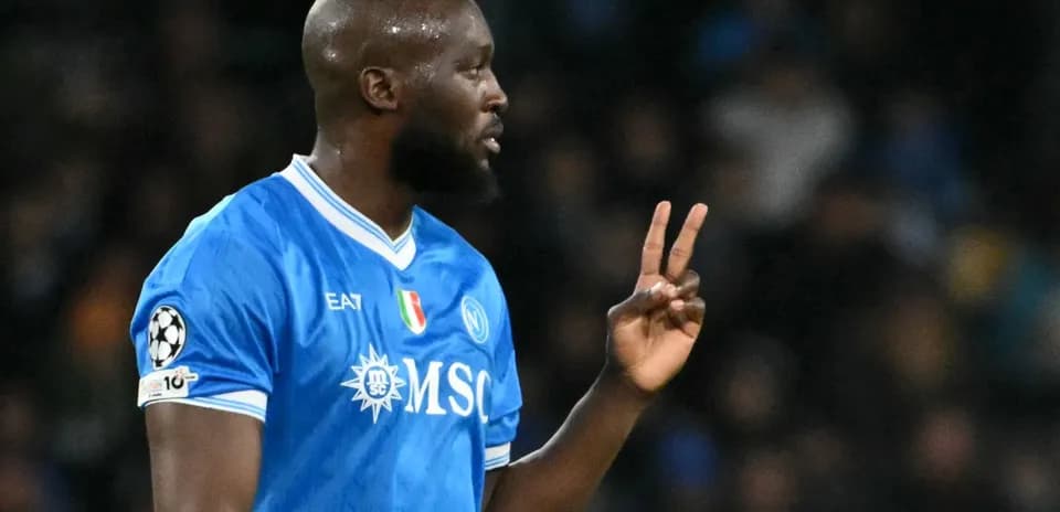 Player gesturing during a match in blue jersey