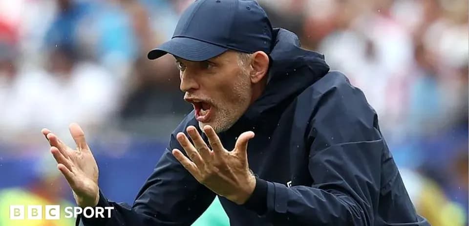 Coach gesturing passionately on the sideline