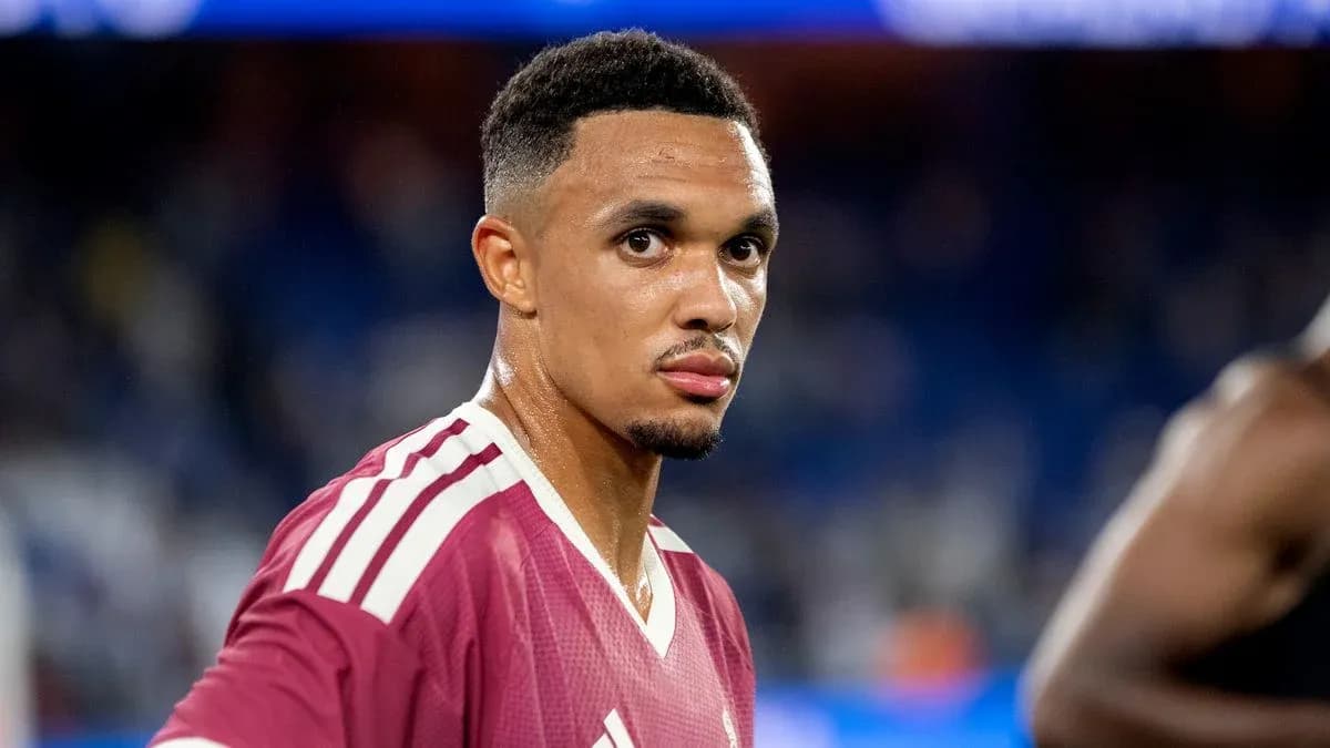 Football player in maroon jersey during match