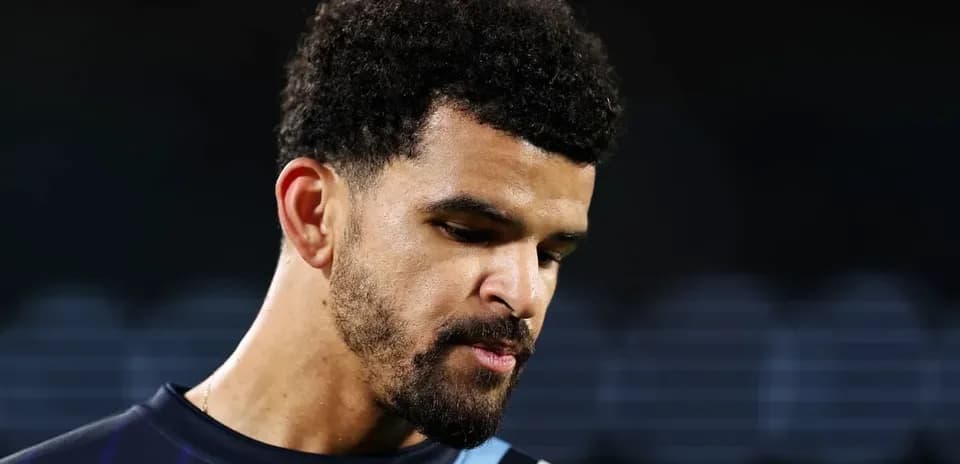 Player looking down during post-match interview