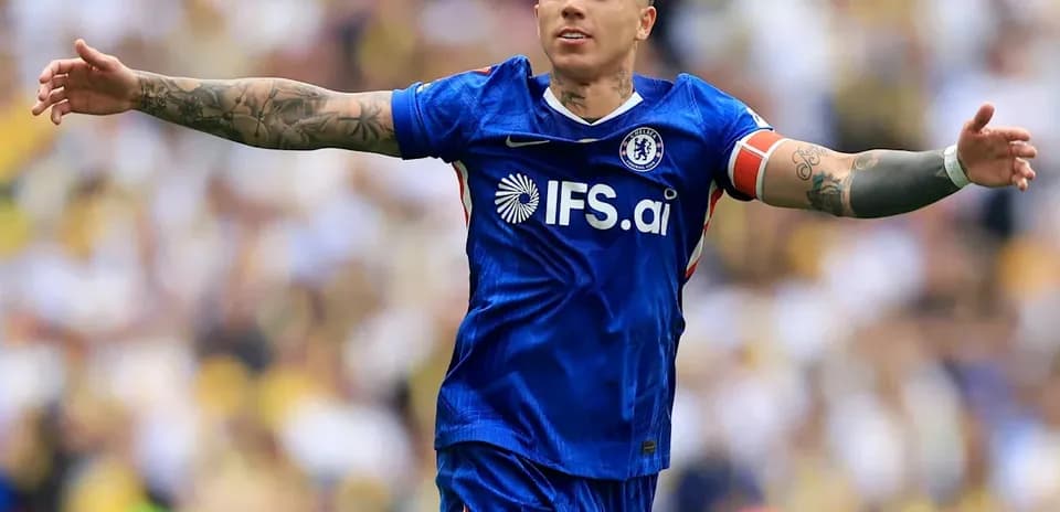Player celebrating during a match in Chelsea kit
