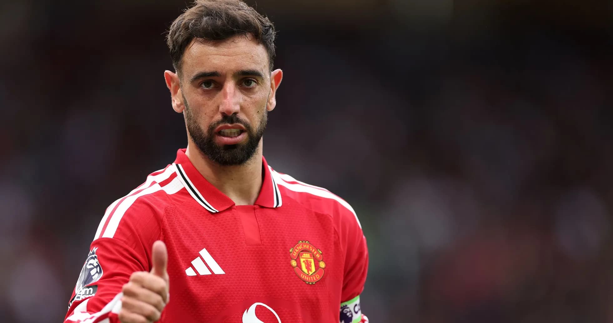 Bruno Fernandes giving a thumbs up in match