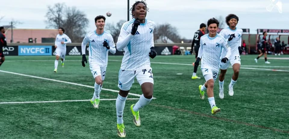 Players celebrating a goal during MLS Next Pro match