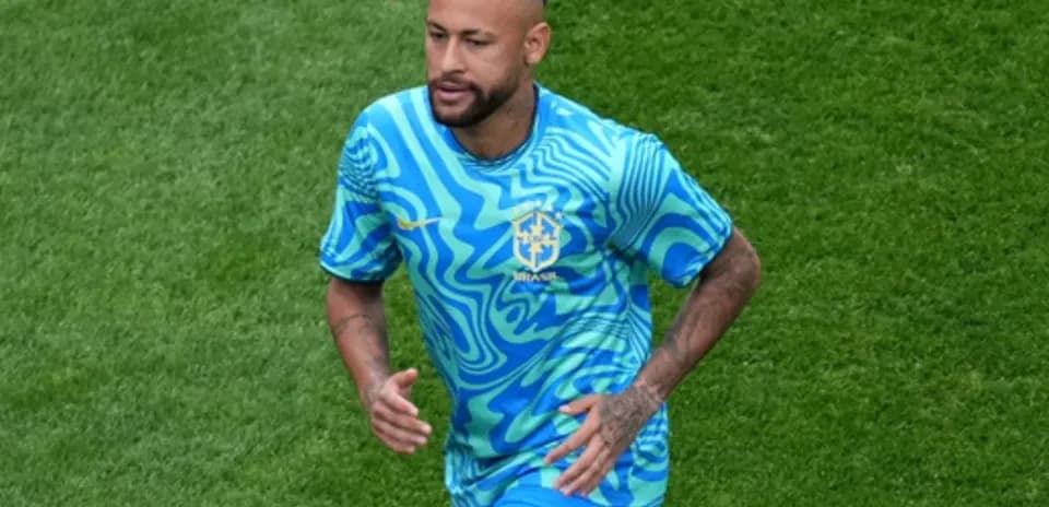 Player wearing Brazil kit running on the pitch