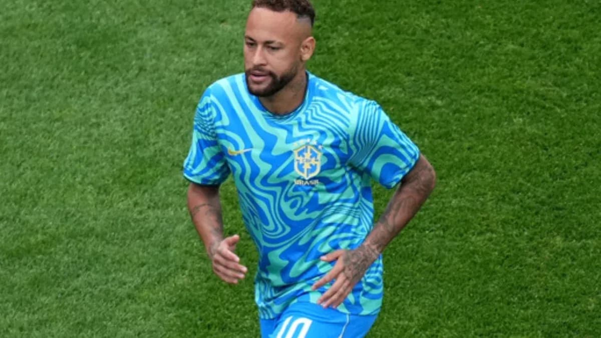 Player wearing Brazil kit running on the pitch