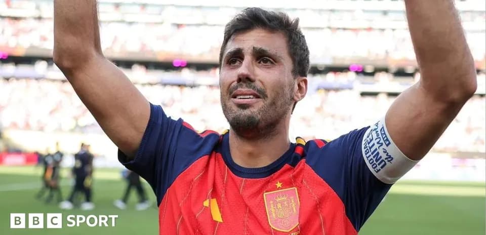 Player celebrating with arms raised after match