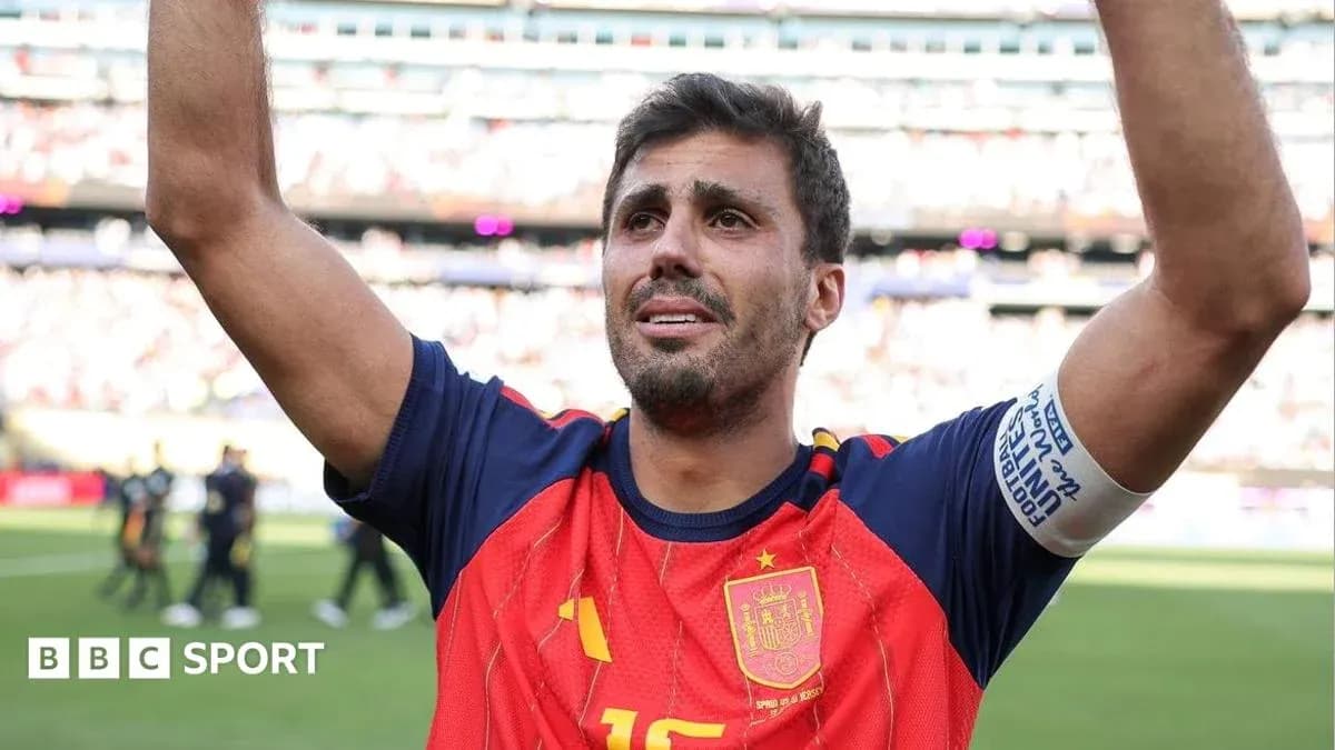Player celebrating with arms raised after match