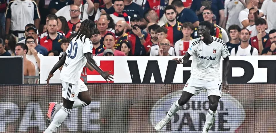 Players celebrating a goal during match