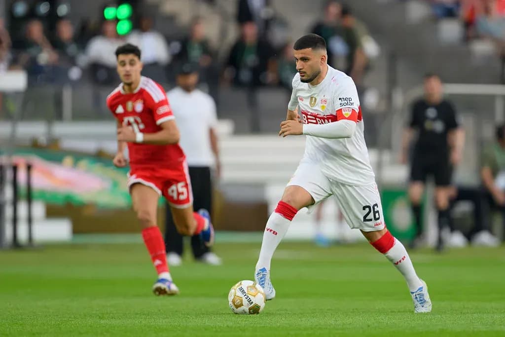 Player dribbling the ball during a soccer match