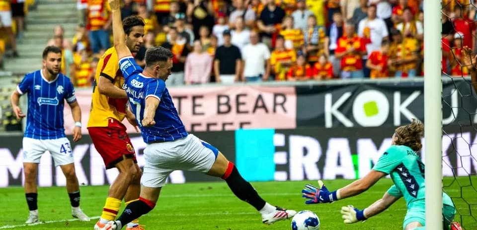Player attempting a shot during Jagiellonia vs Rangers match