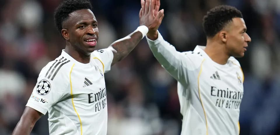 Vinícius Júnior and teammate celebrating during match