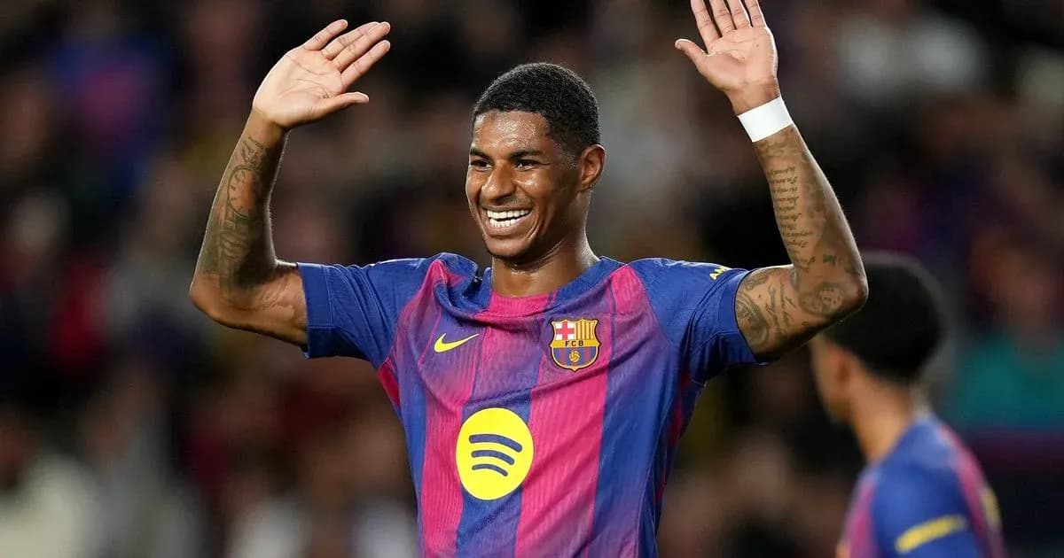 Player celebrating with raised hands on the field