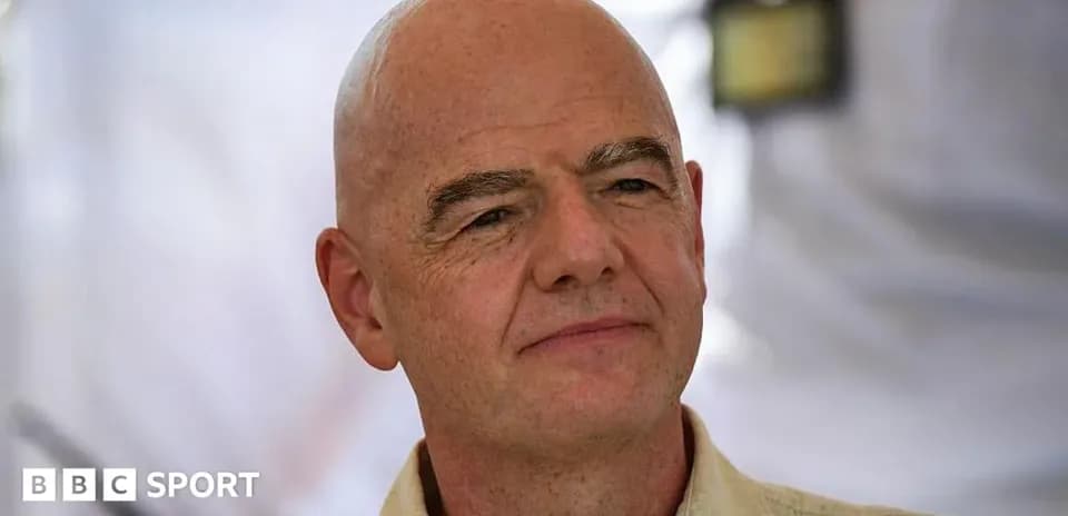 Man with bald head and light shirt