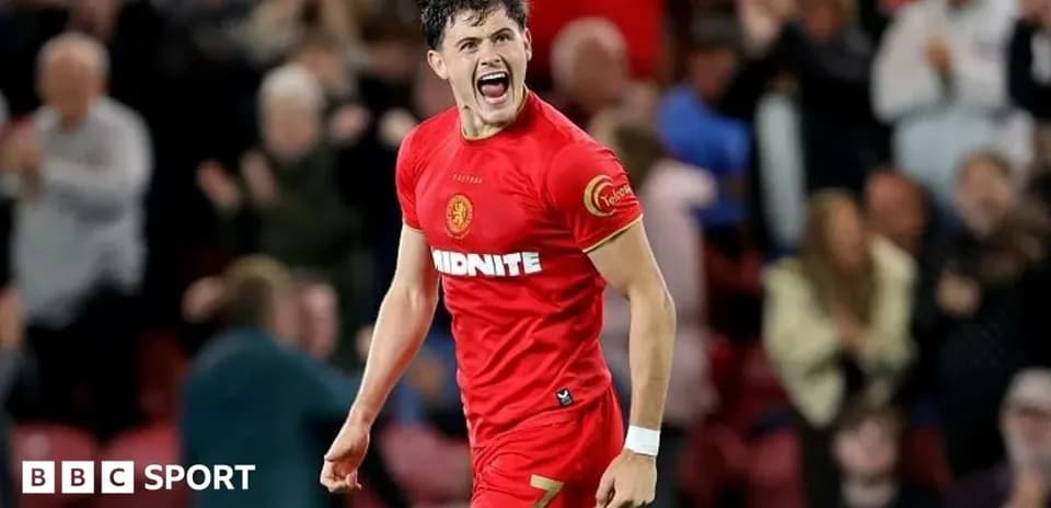 Player celebrating after scoring a goal in match